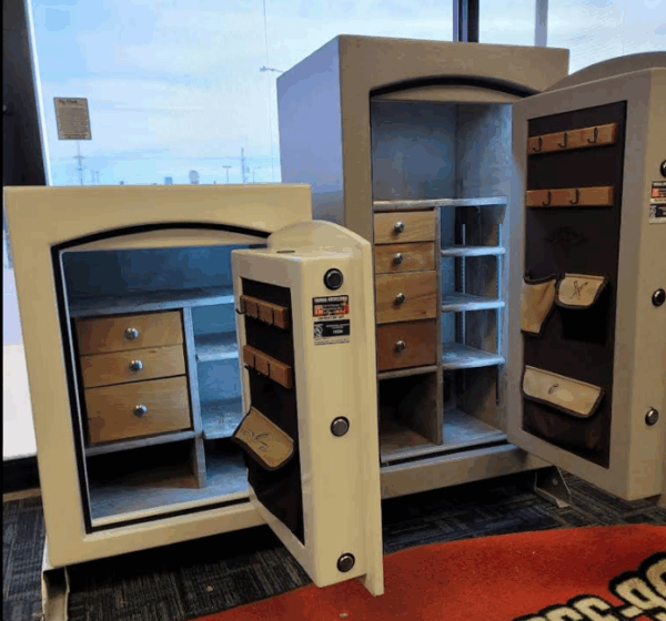 Two Champion-brand safes in a locksmith storefront.