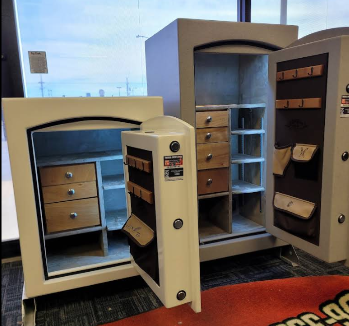 Two Champion-brand safes in a locksmith storefront.